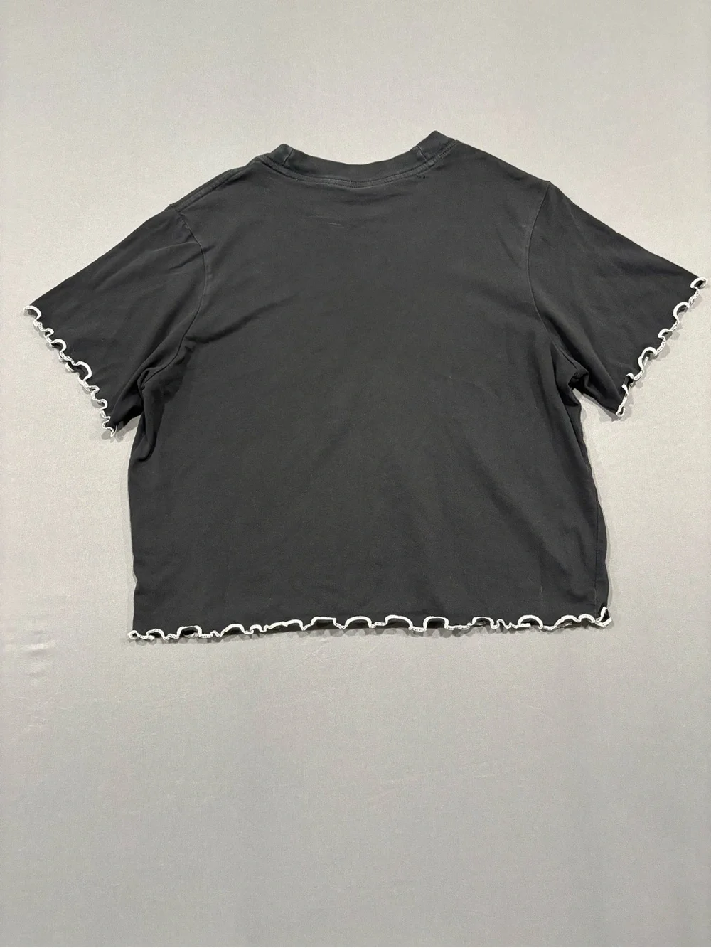 Nike Black Cropped Tee with White Swoosh and Lettuce Hem